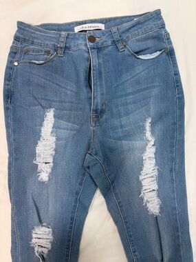 Fashion Nova Blue Ripped Skinny Jeans